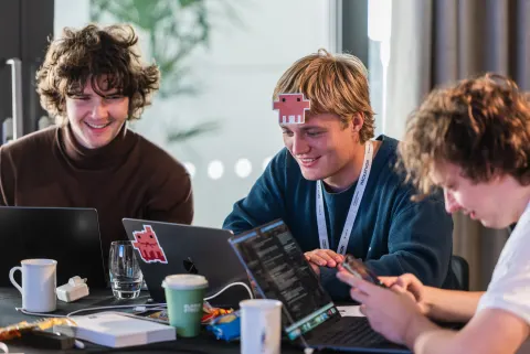 Participants working on AI agents at the London AI Hackathon.